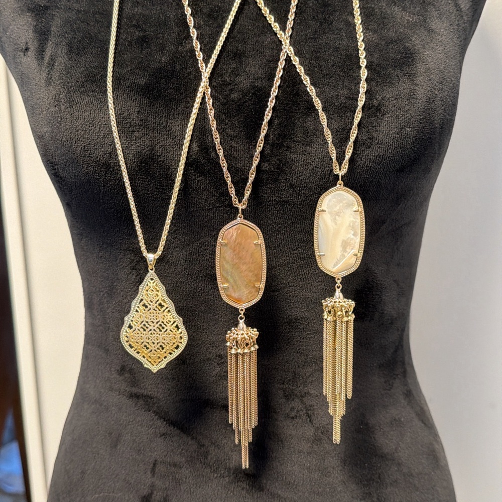 Three Kendra Scott pendant necklaces